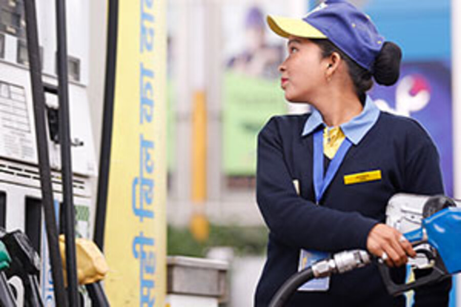 Bharat Petroleum retail team member serving a customer